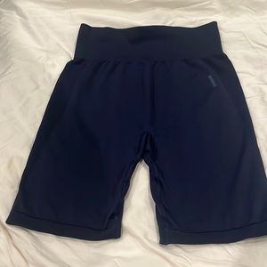 Dark blue L gym shark shorts.